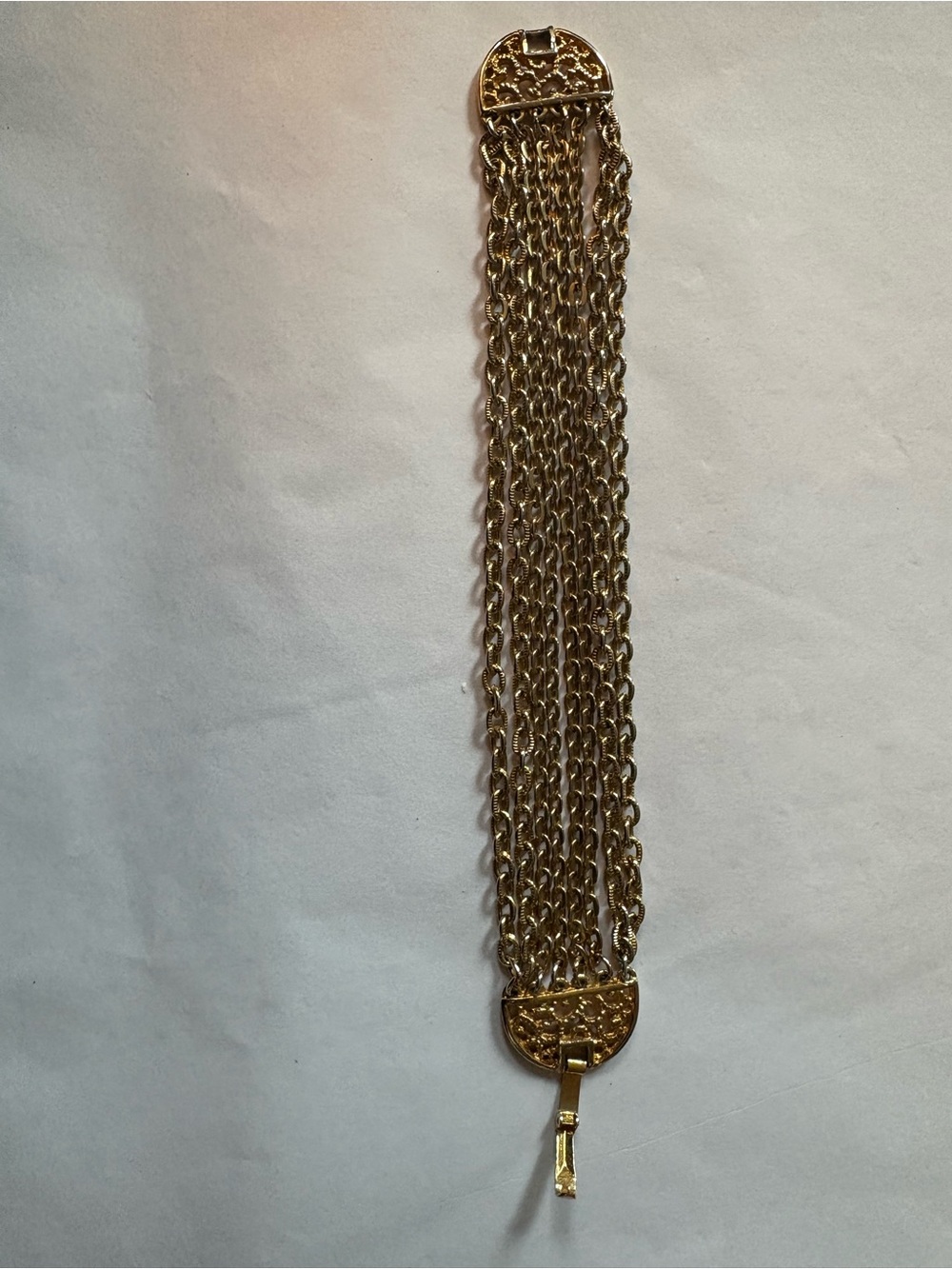 Celebrity Gold Tone multi strand bracelet. Celebrity stamped on clasp.